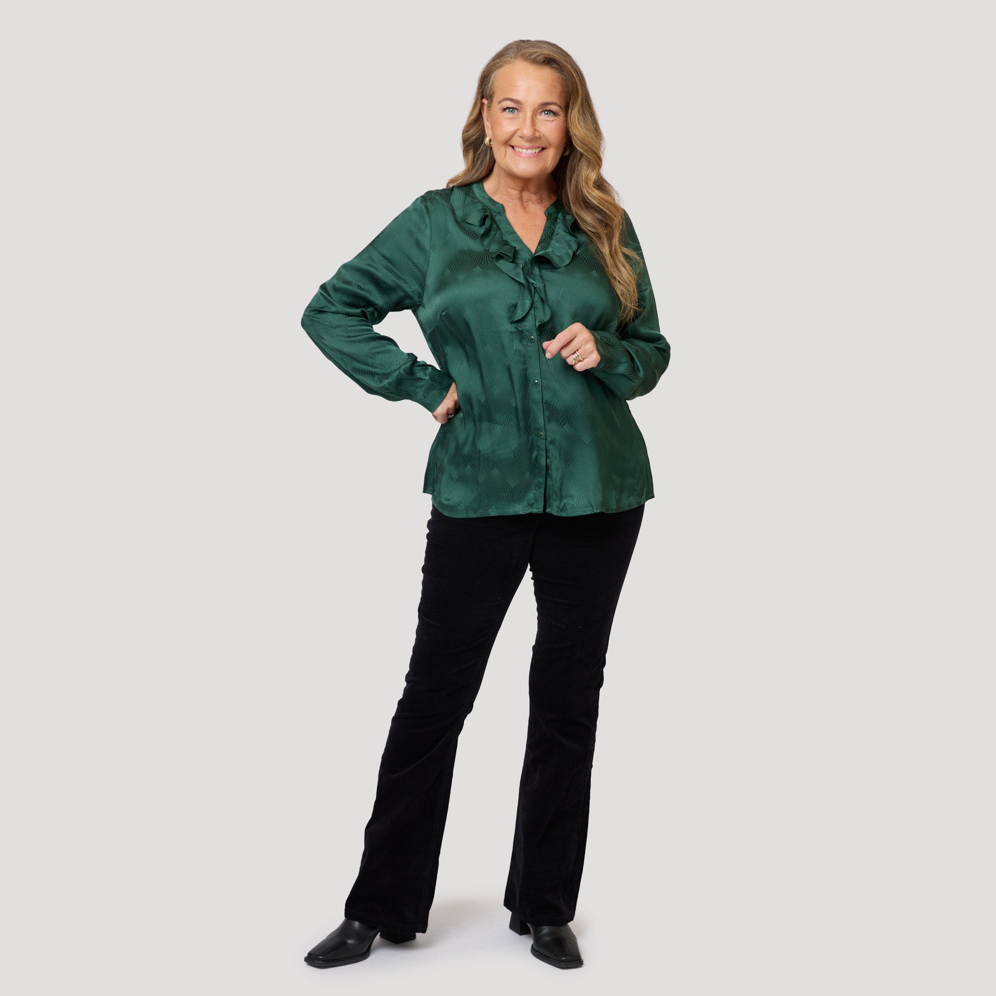 Grön blus med sammetbyxor